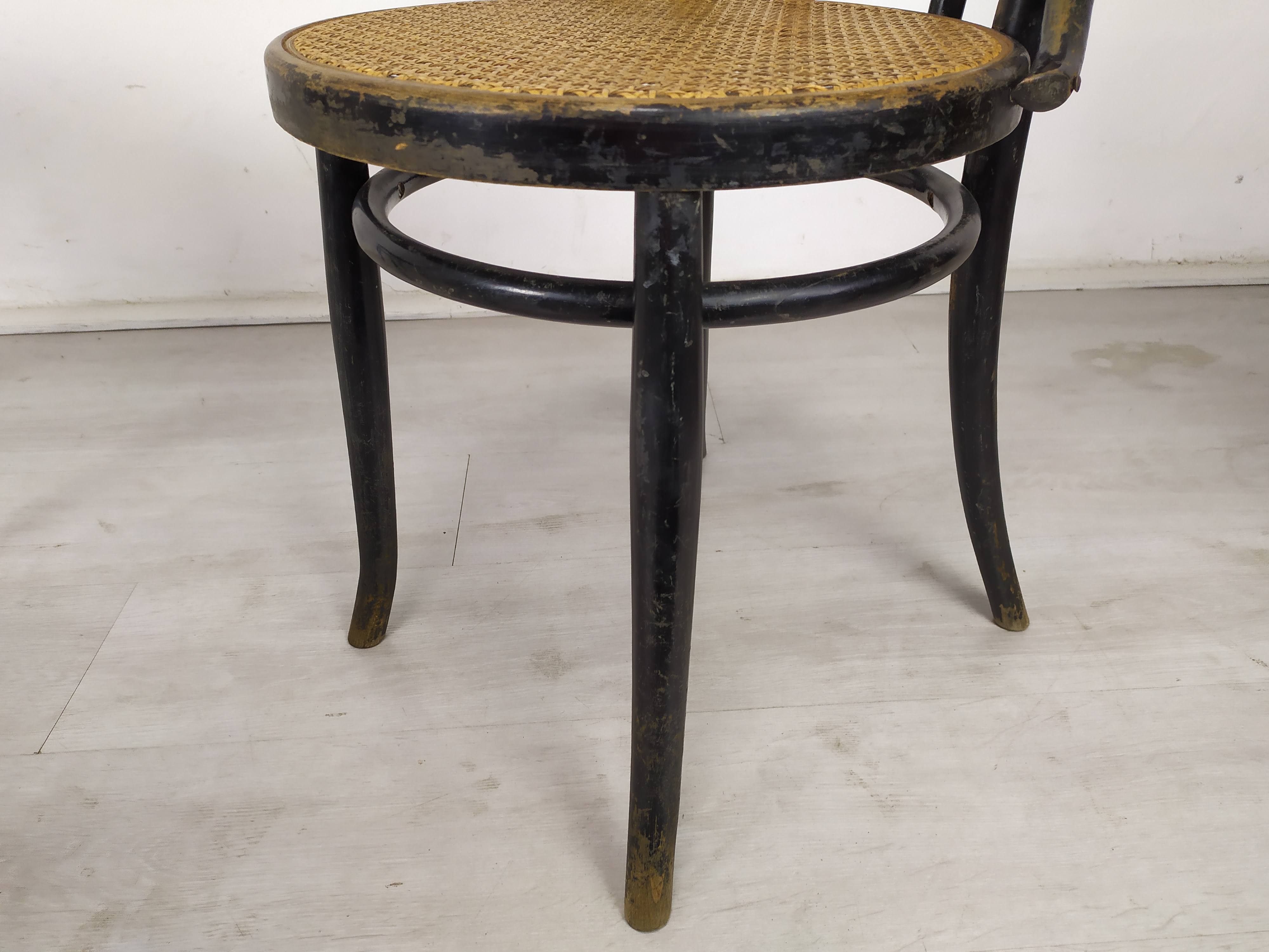 Black canned bistro chairs