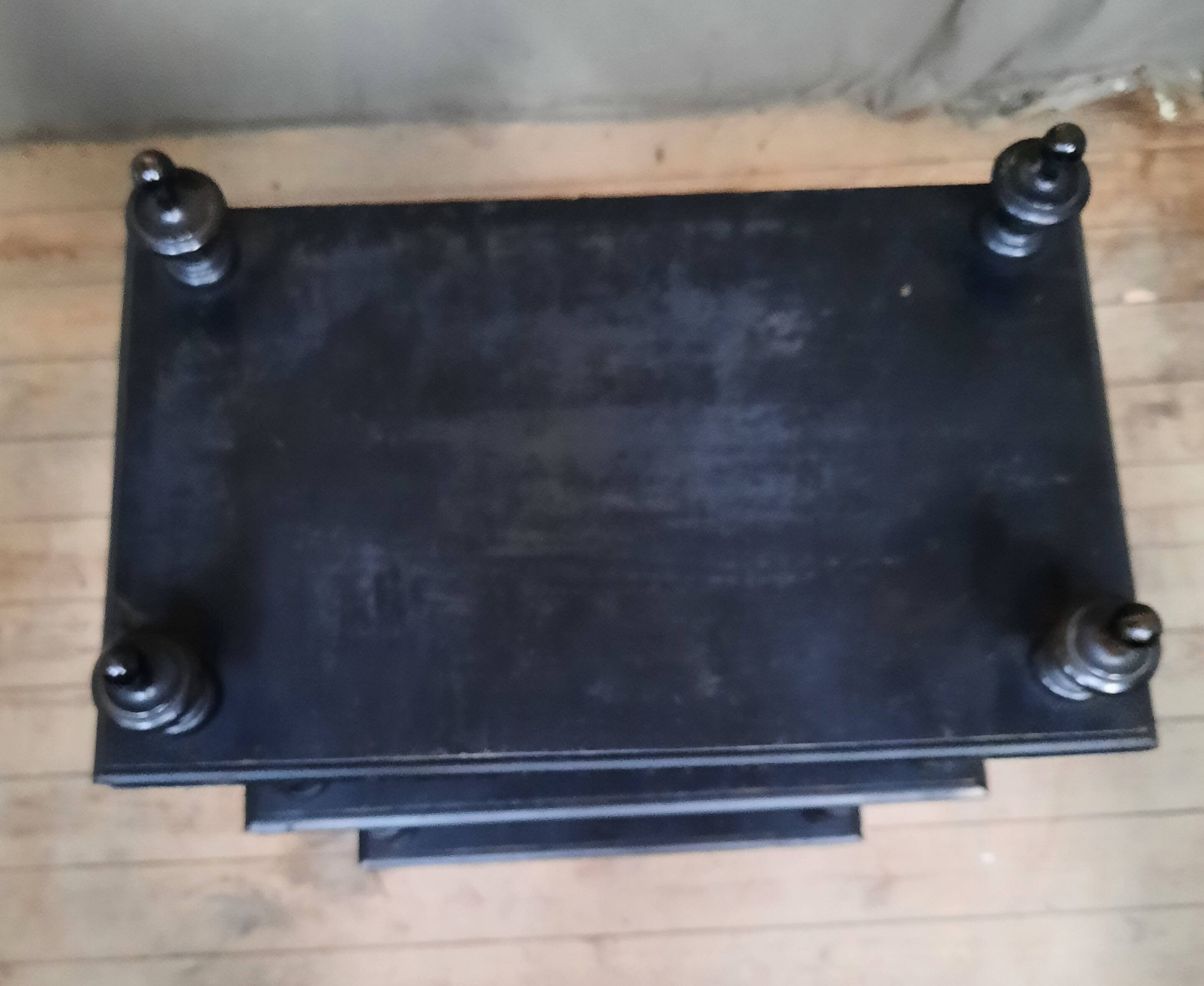 Blackened wooden shelf