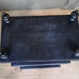 Blackened wooden shelf