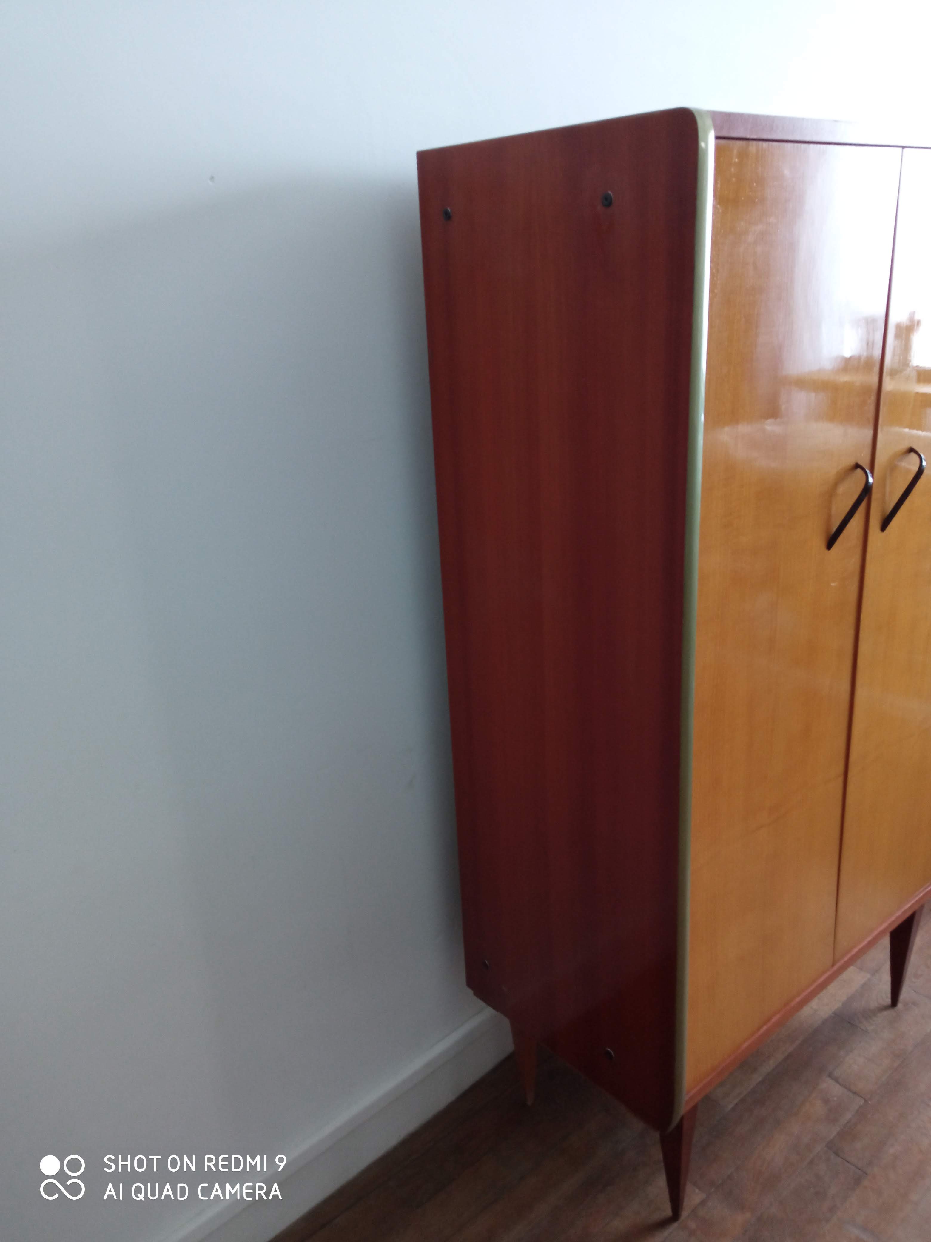 Vintage 1950s compas foot cabinet