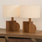 Pair of geometric handcrafted lamps in solid oak circa 1970.