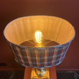 Lamp base in gilded brass, oval silk lampshade with a checkered pattern in burgundy.