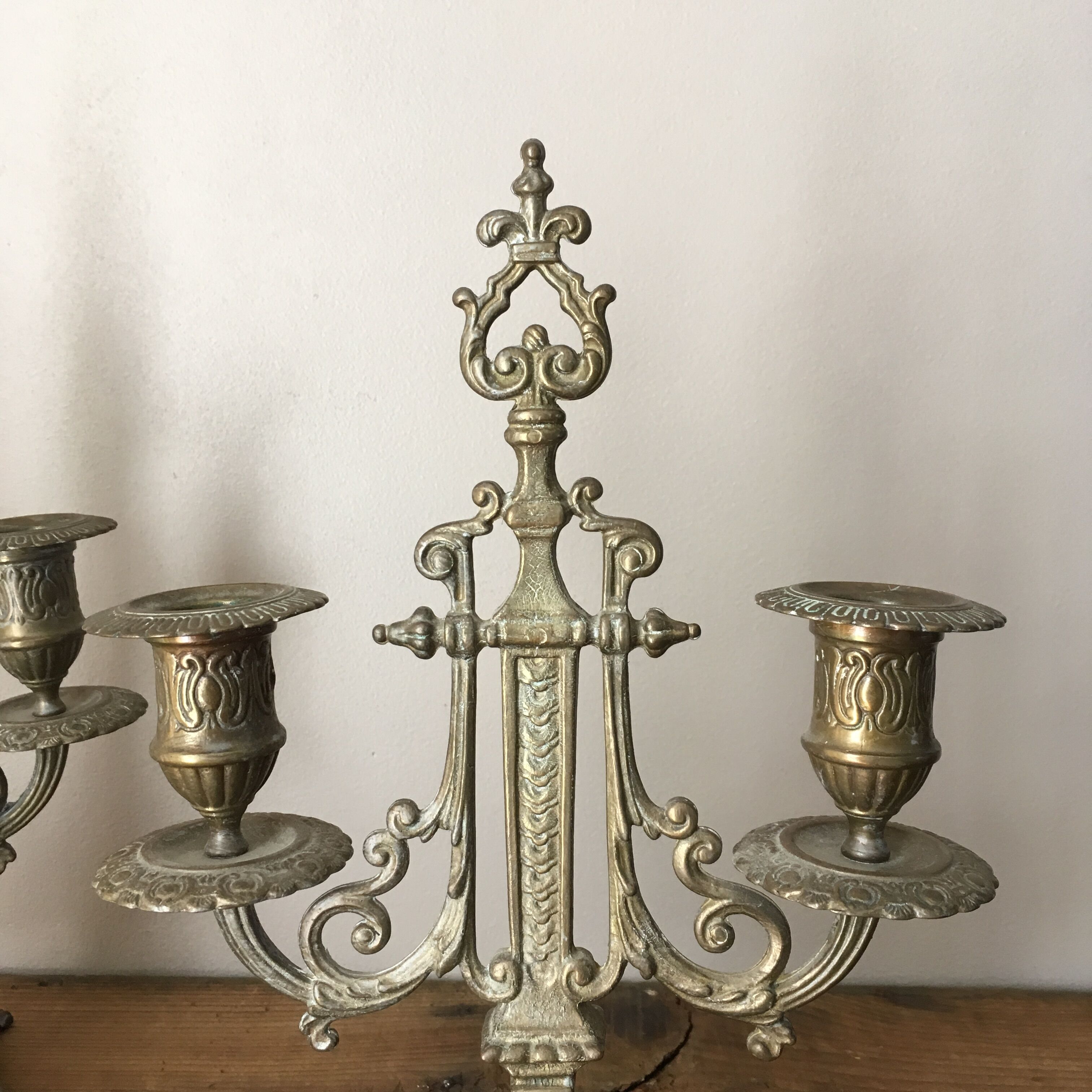 2 gold metal candlesticks