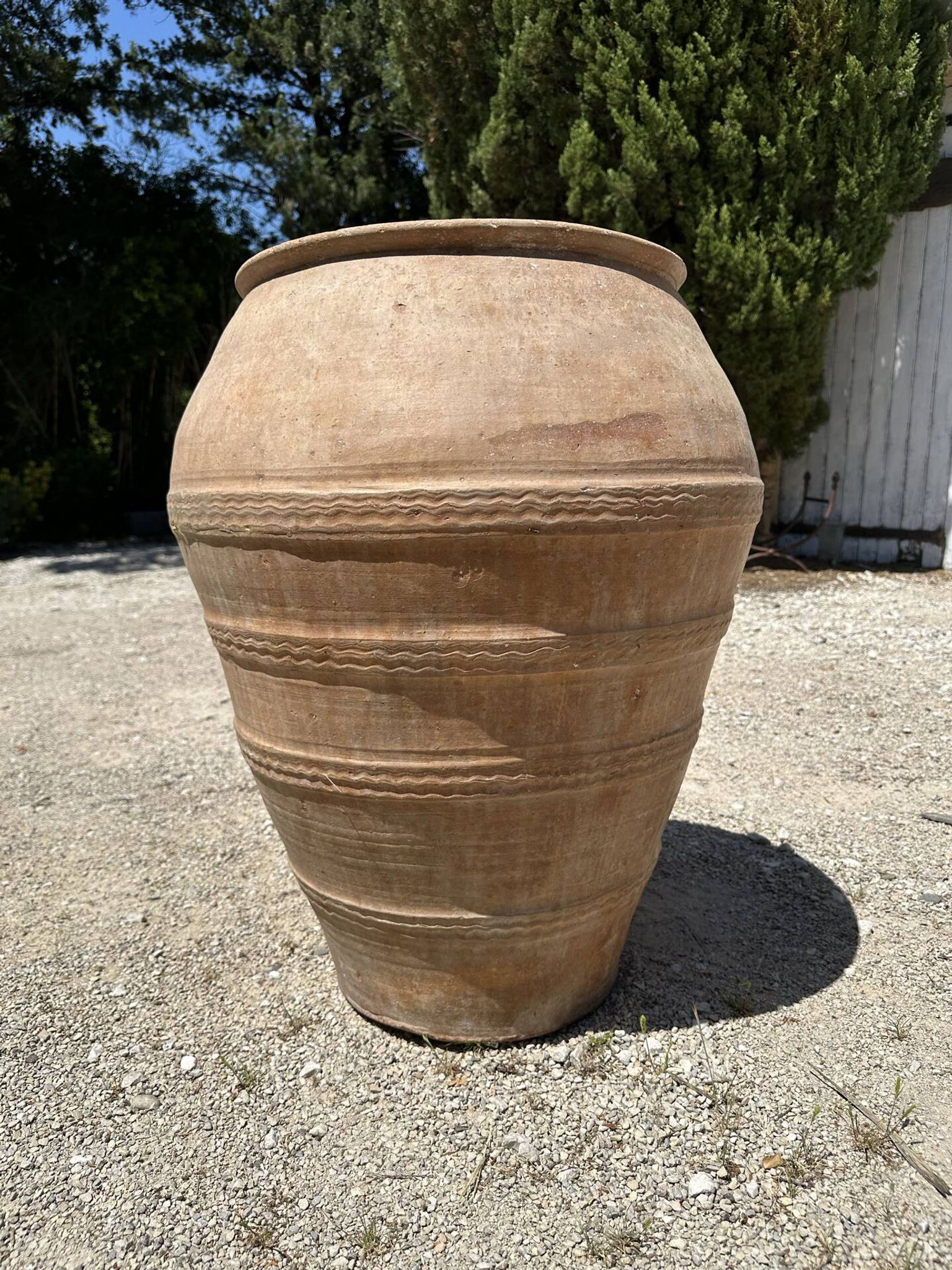 Ancient terracotta pottery jar