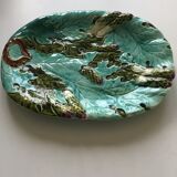 Old dish sprayed in slurry sign