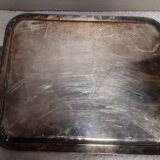 Silver-plated service tray with handles, neoclassical decoration.