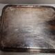 Silver-plated service tray with handles, neoclassical decoration.