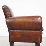 Large design armchair made of sheep leather
