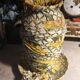 Vase and ceramic cup in fabrics