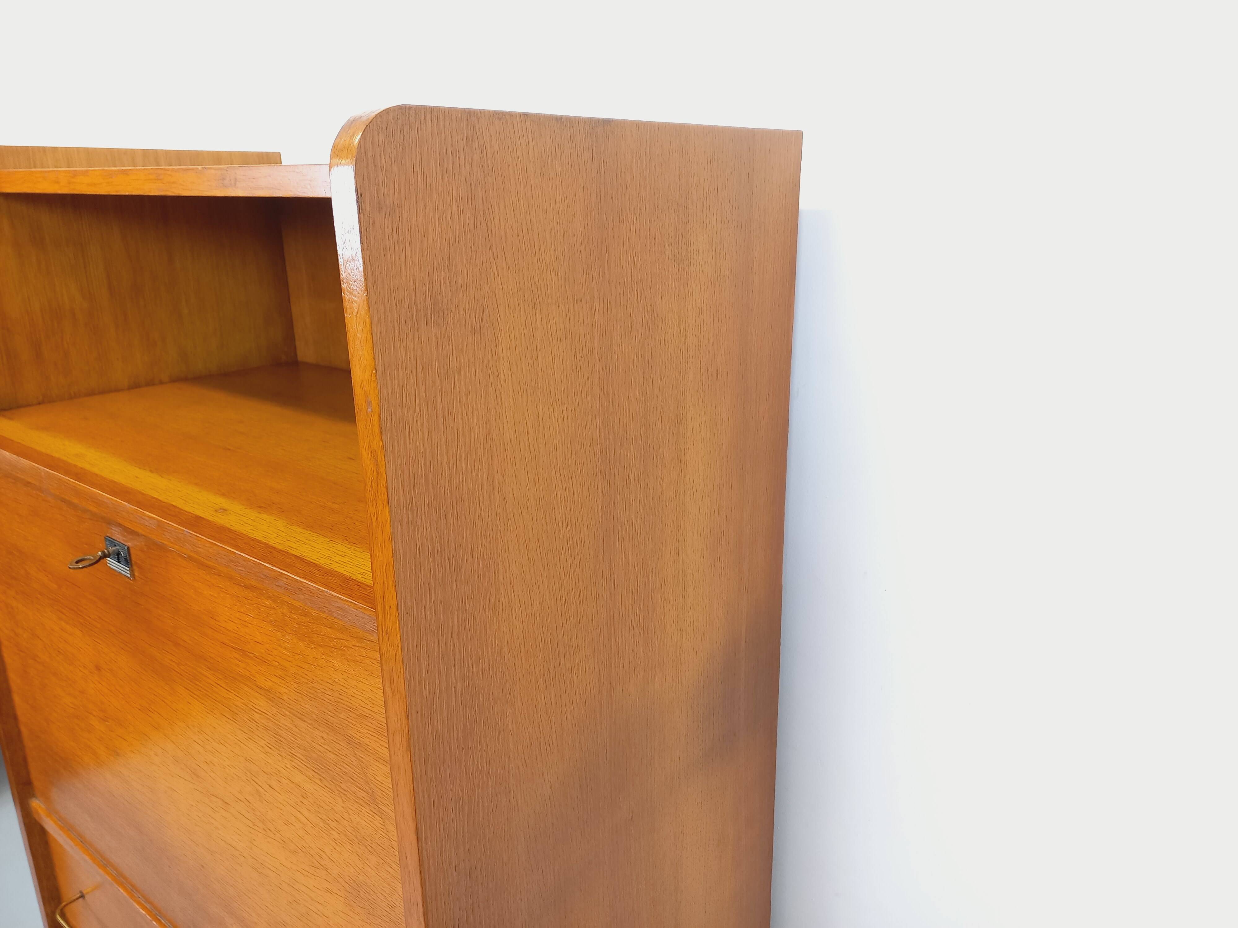 Vintage oak secretary storage furniture from the 1950s and 60s.