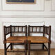 Pair of rush-seated chairs by the fireside "bobbin"