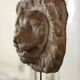 Three cast-iron and terracotta façade decoration lions, around 1880.