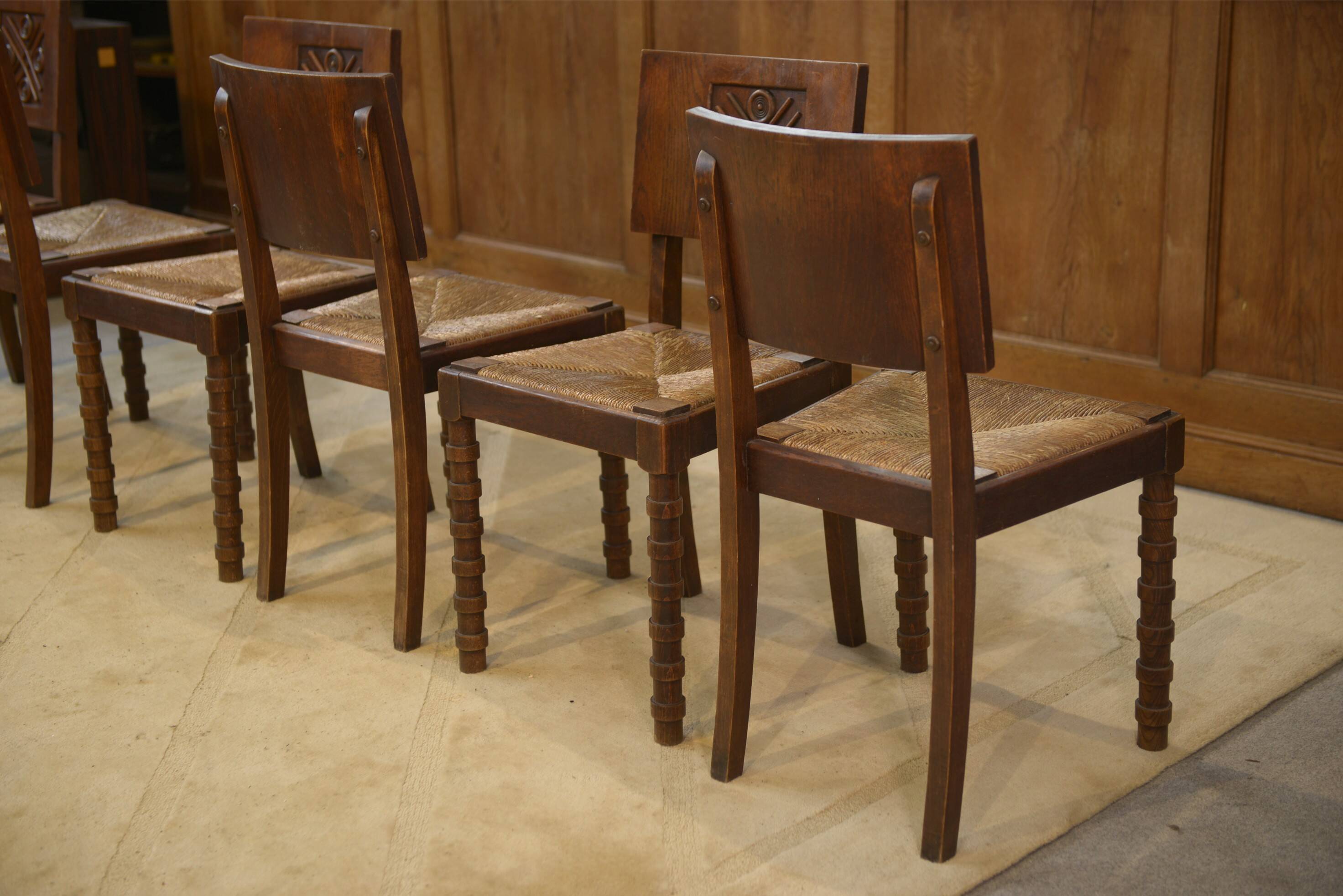 Ensemble de 6 chaises Charles Dudouyt en chêne 1950’s
