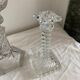Duo of glass candlesticks