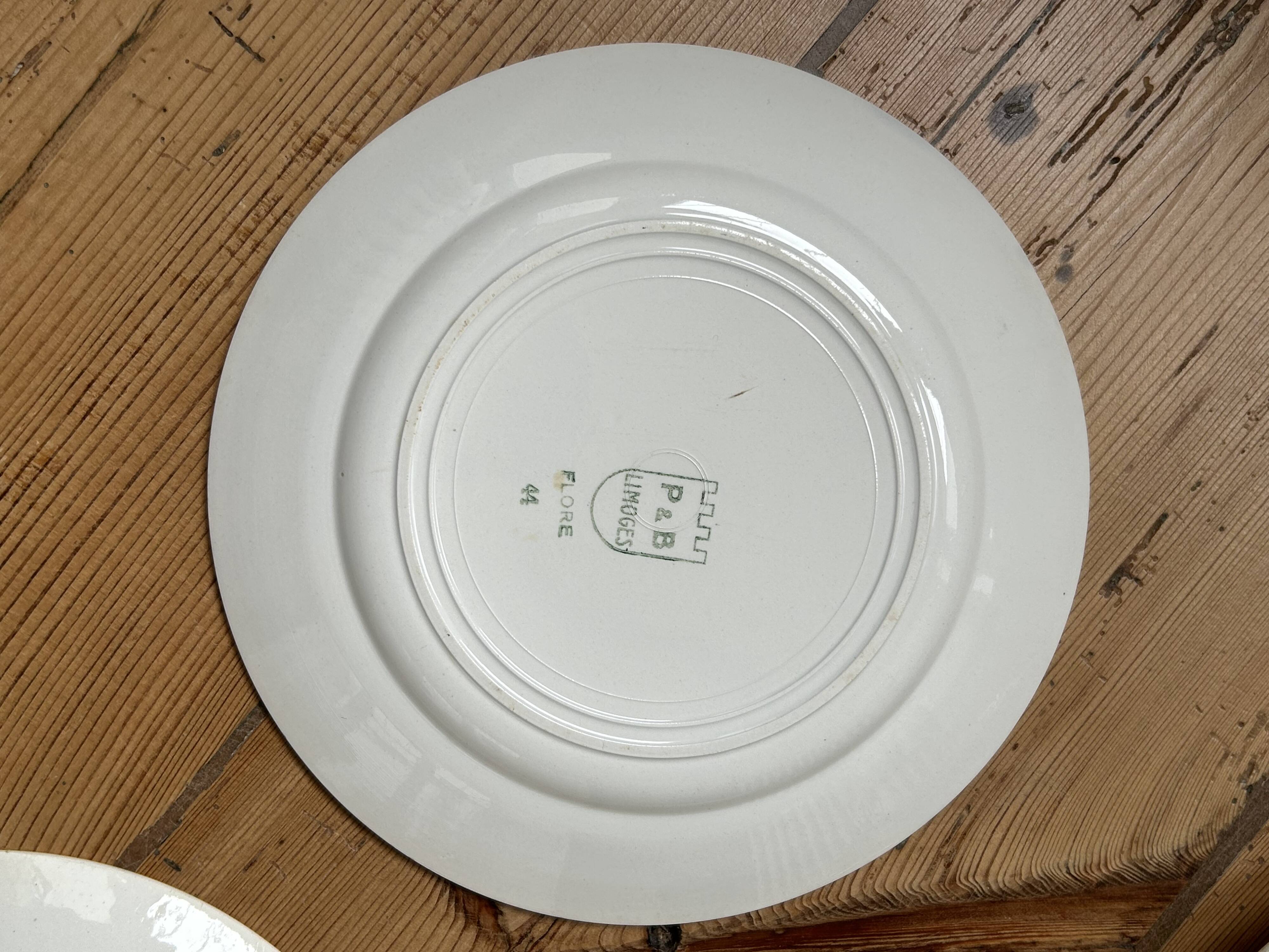 Set of 4 old Limoges flat plates