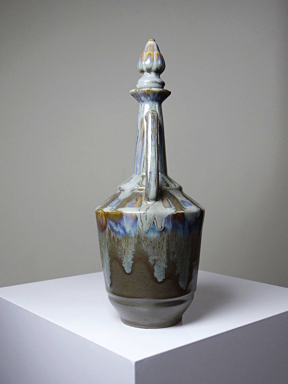 Vintage stoneware bottle with flamed glaze, France 1950-1970.
