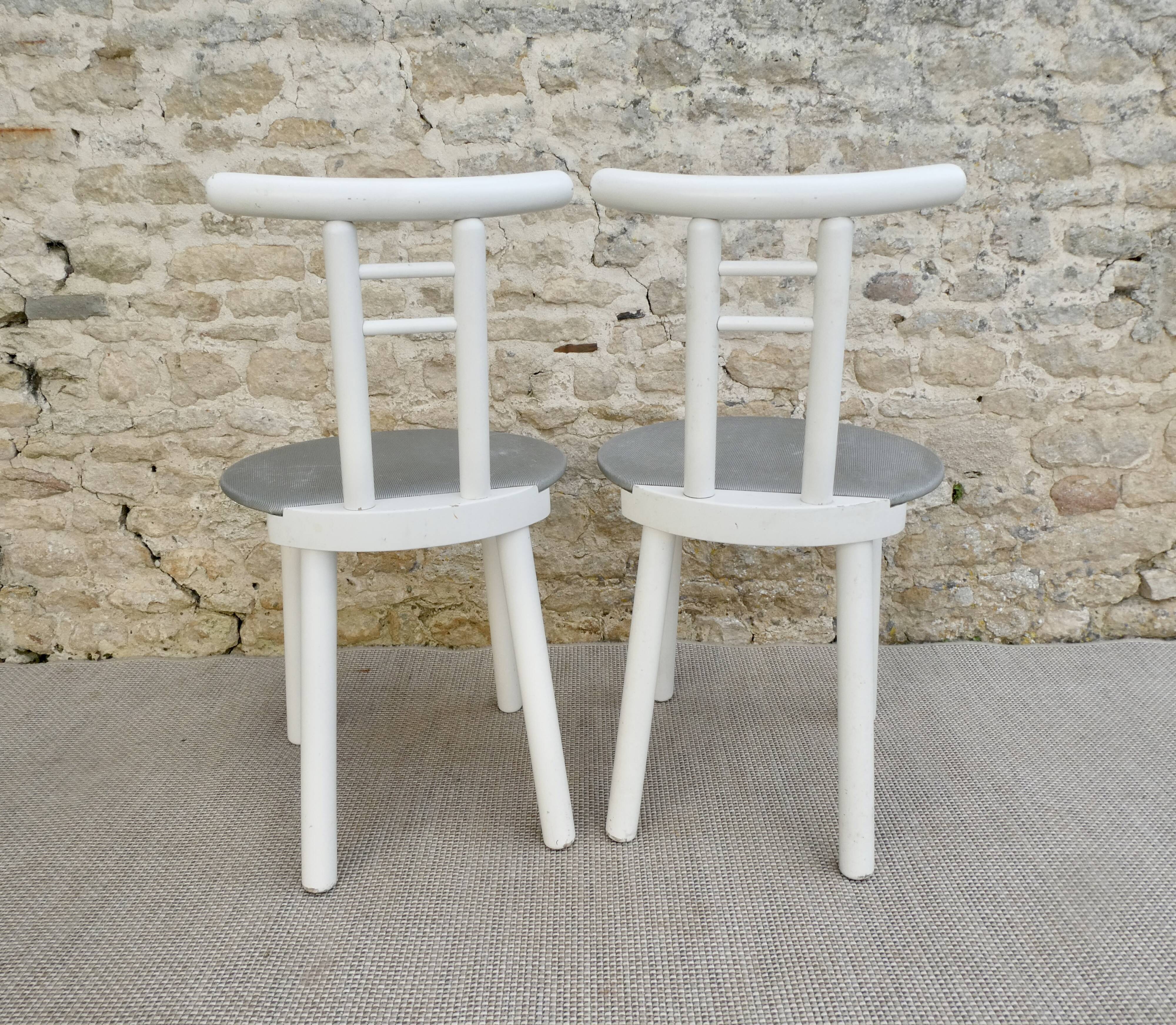 Pair of wooden and Skaï chairs from the 80s, Italy