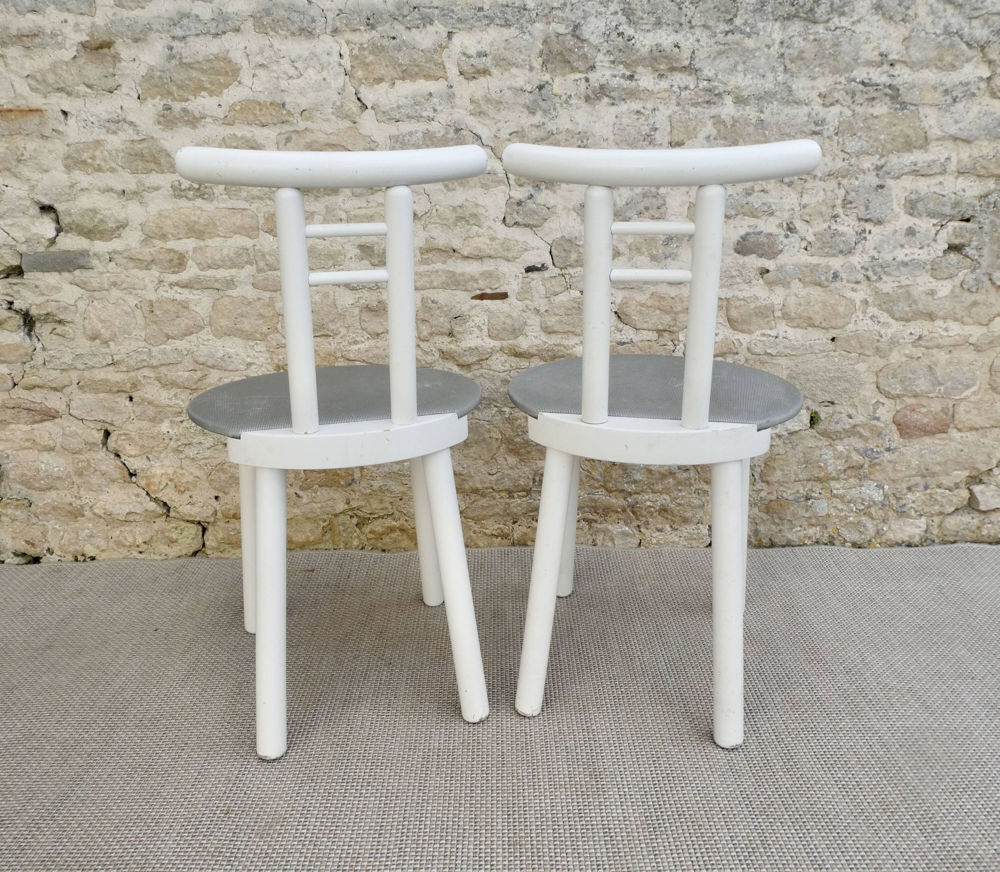 Pair of wooden and Skaï chairs from the 80s, Italy