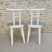 Pair of wooden and Skaï chairs from the 80s, Italy
