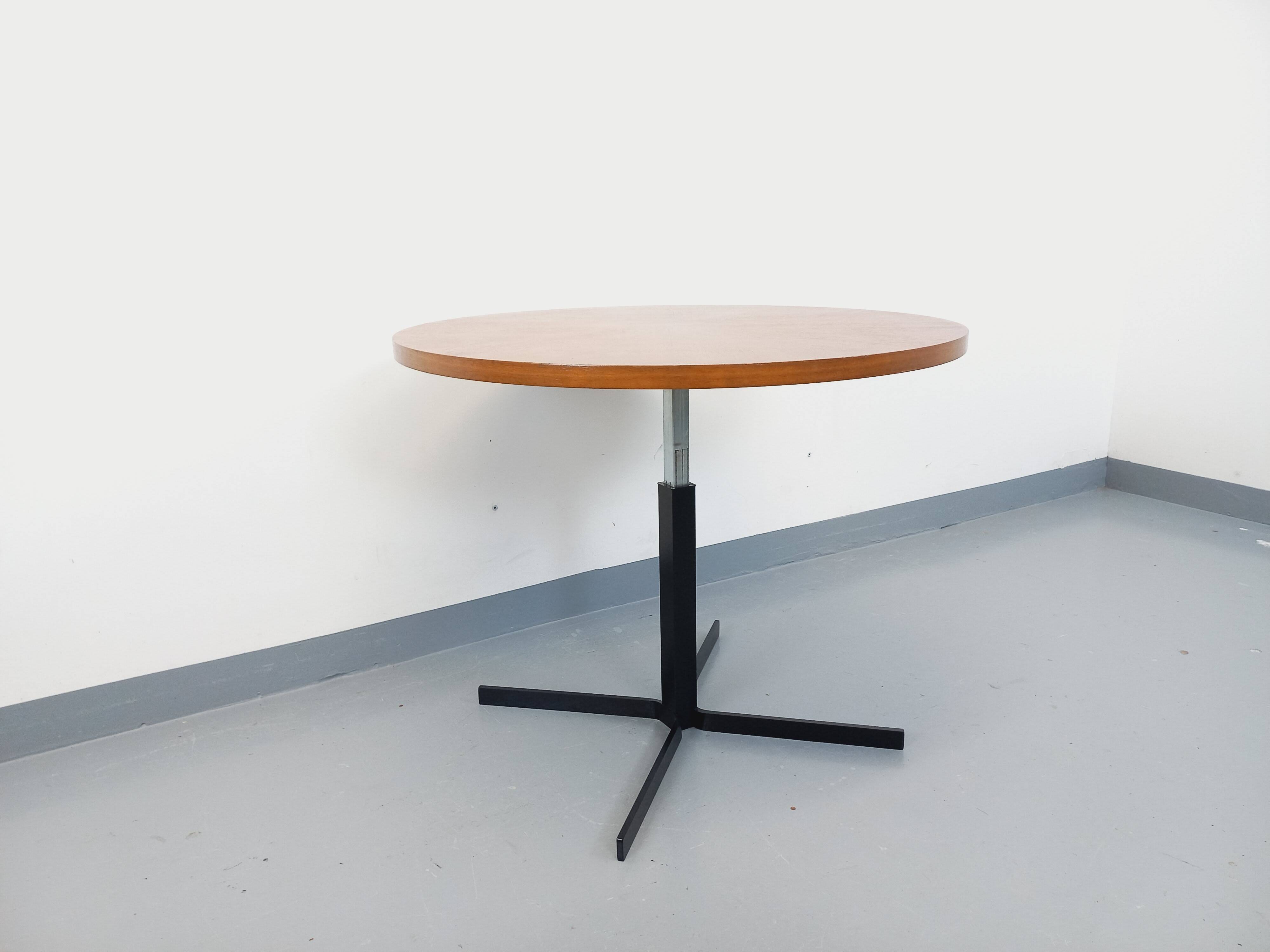 Large round coffee table in vintage Scandinavian style, modular into a table.