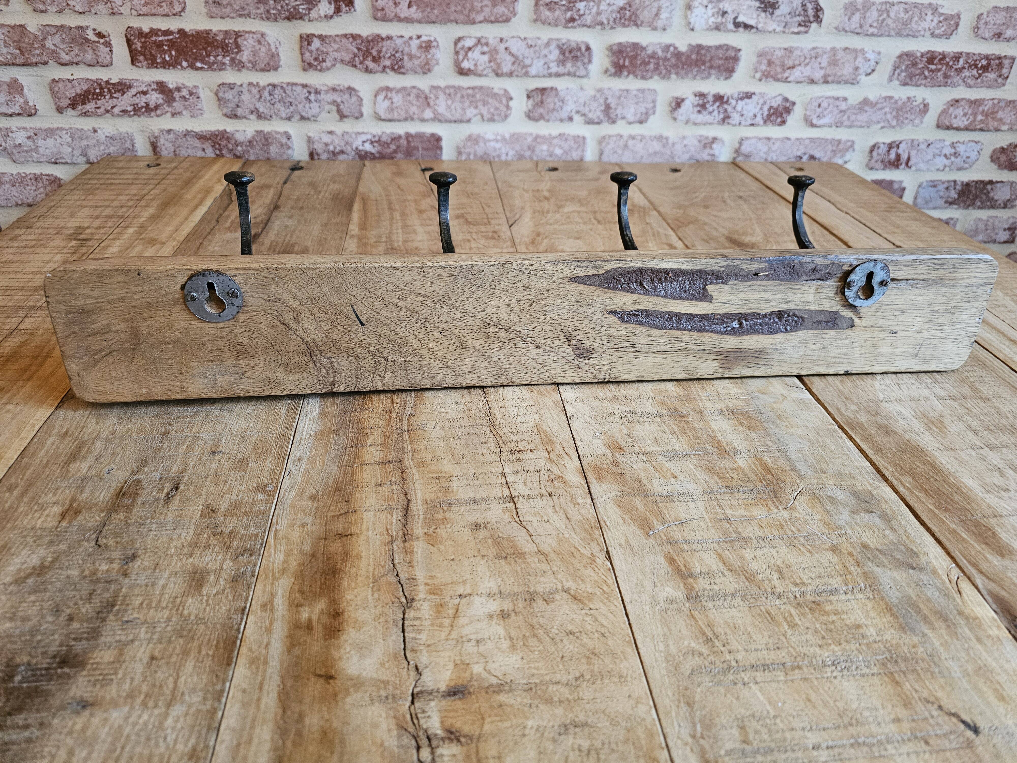 Solid teak coat hook with 4 double cast iron hooks