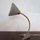 Scandinavian articulated lamp EWÅ for table or wall mounting.