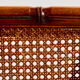 Walnut armchair with bamboo design