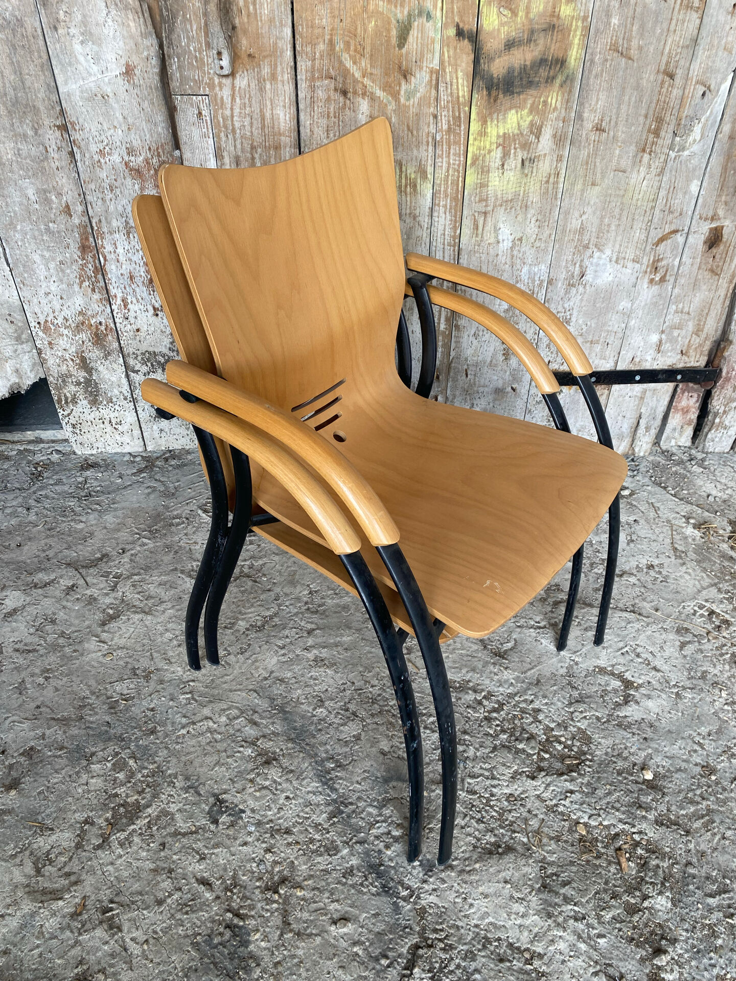 Pair of Vintage RONÉO Armchairs with Black Metal Legs + Curved Wooden Shell