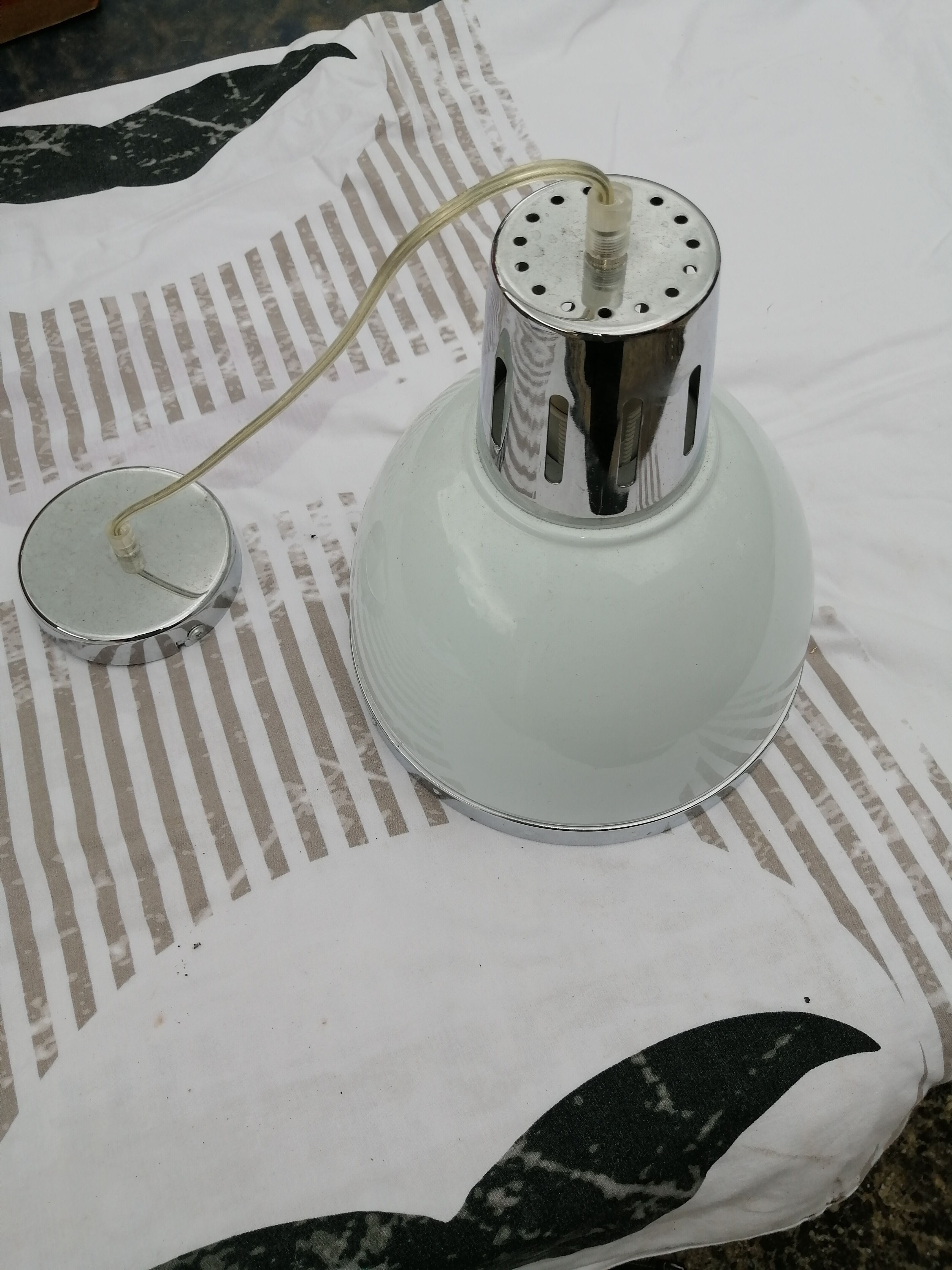 White and chrome industrial suspension