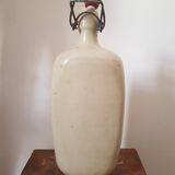 Triangular stoneware bottle