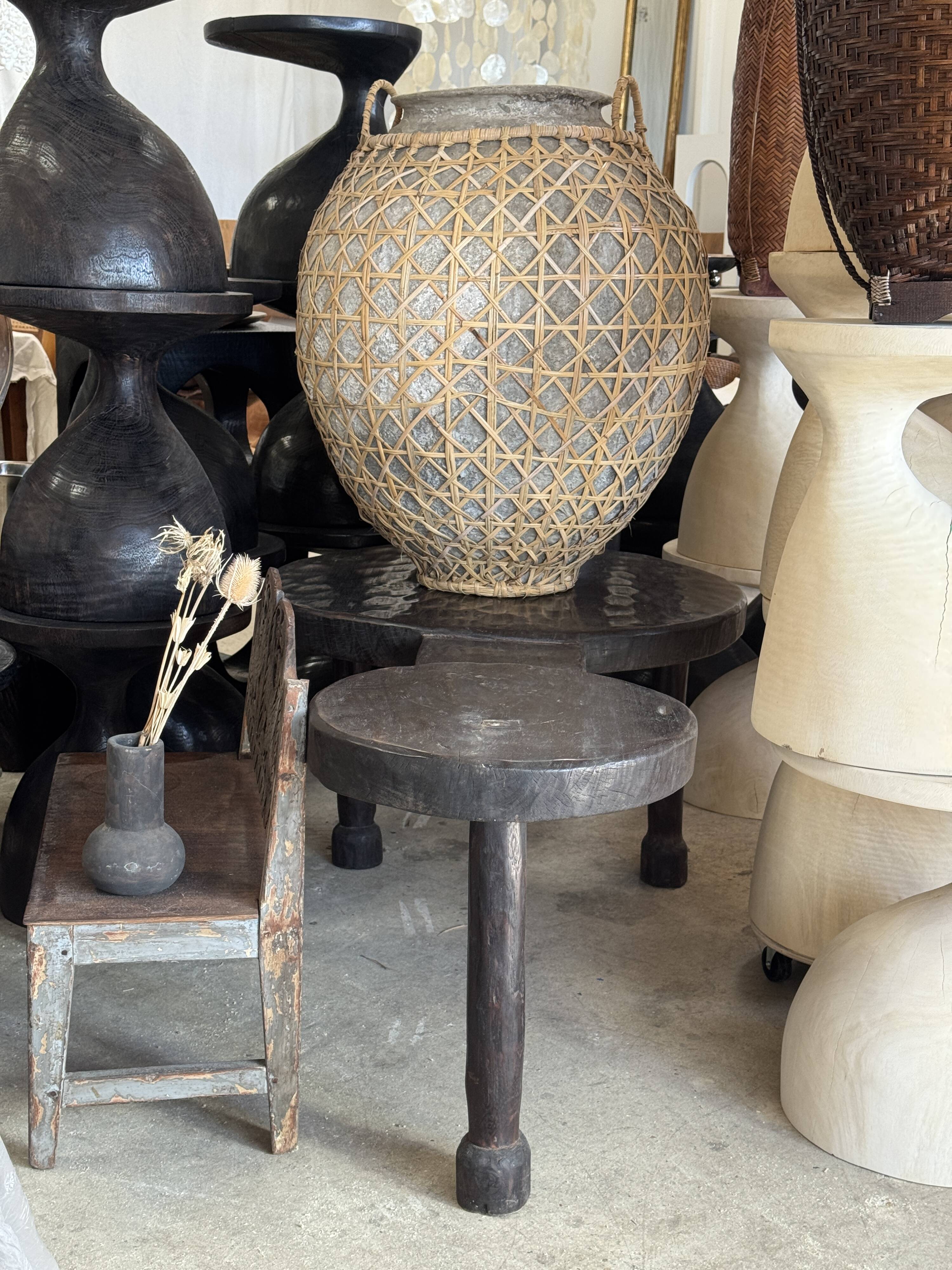 Immense light grey antique-style pot with a crosshatch lid and handles.