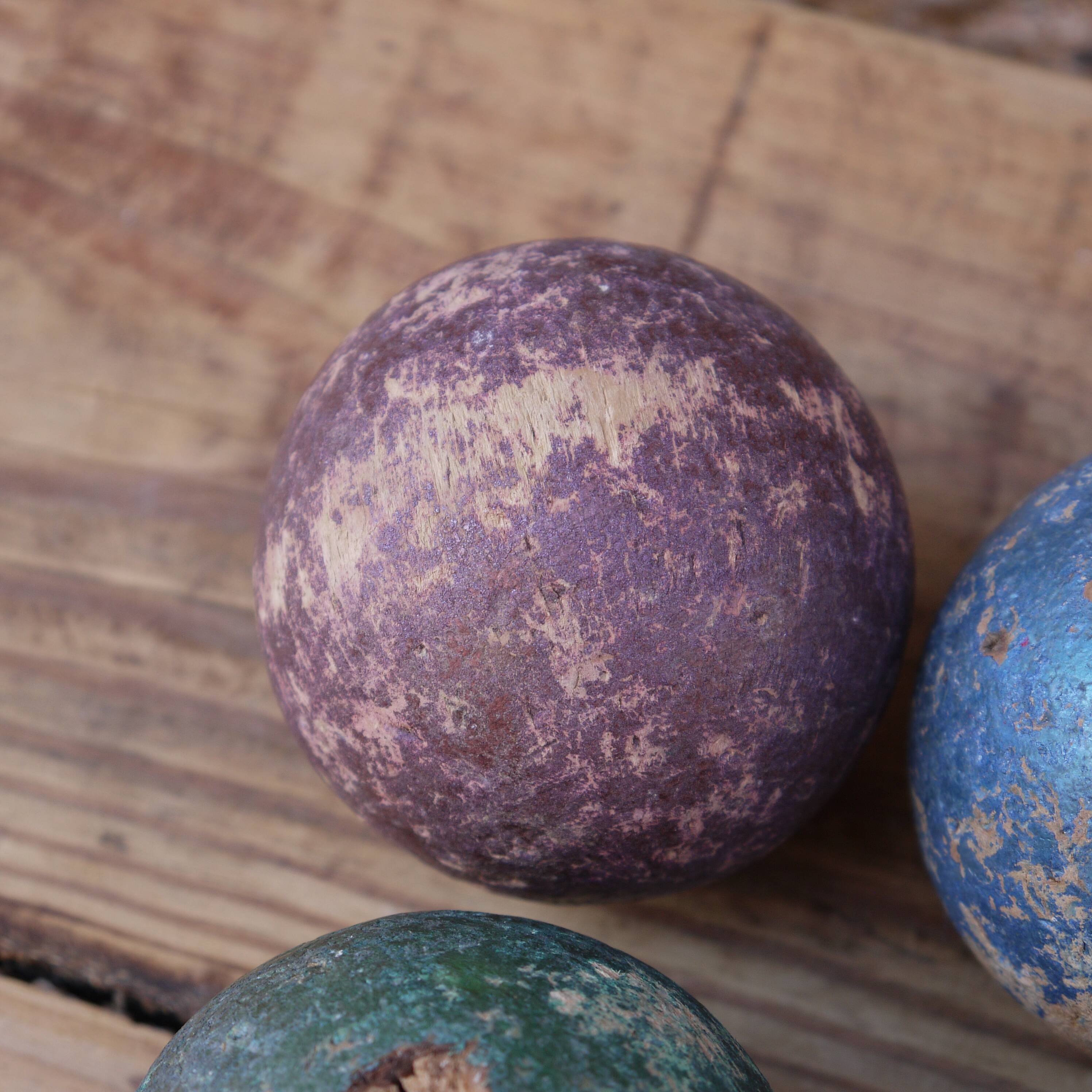 Four bowling balls