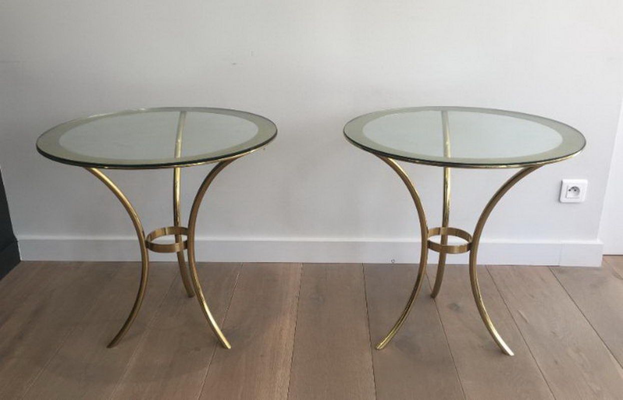 Pair of round gold side tables