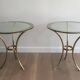 Pair of round gold side tables