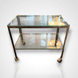 Jacques Quinet for Broncz, wheeled cart in bronze and glass, 20th century.