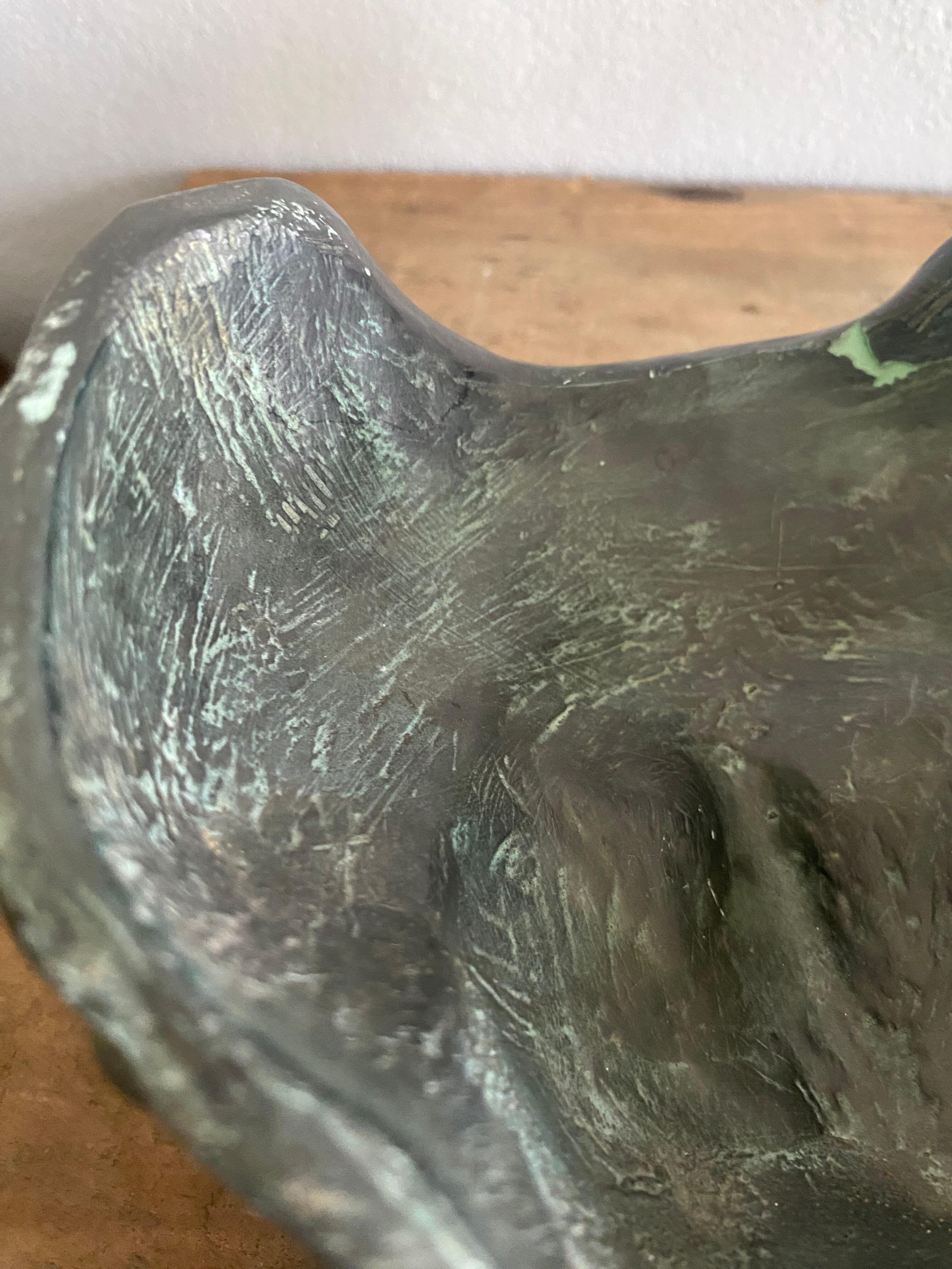 Greek head in patinated plaster with marble base