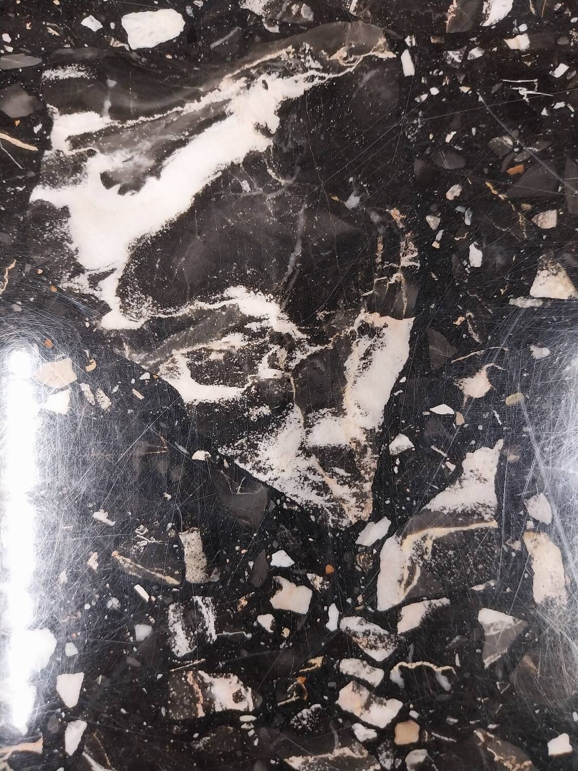 Black travertine eye coffee table