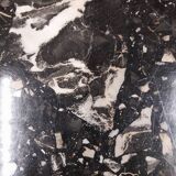 Black travertine eye coffee table
