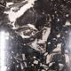 Black travertine eye coffee table