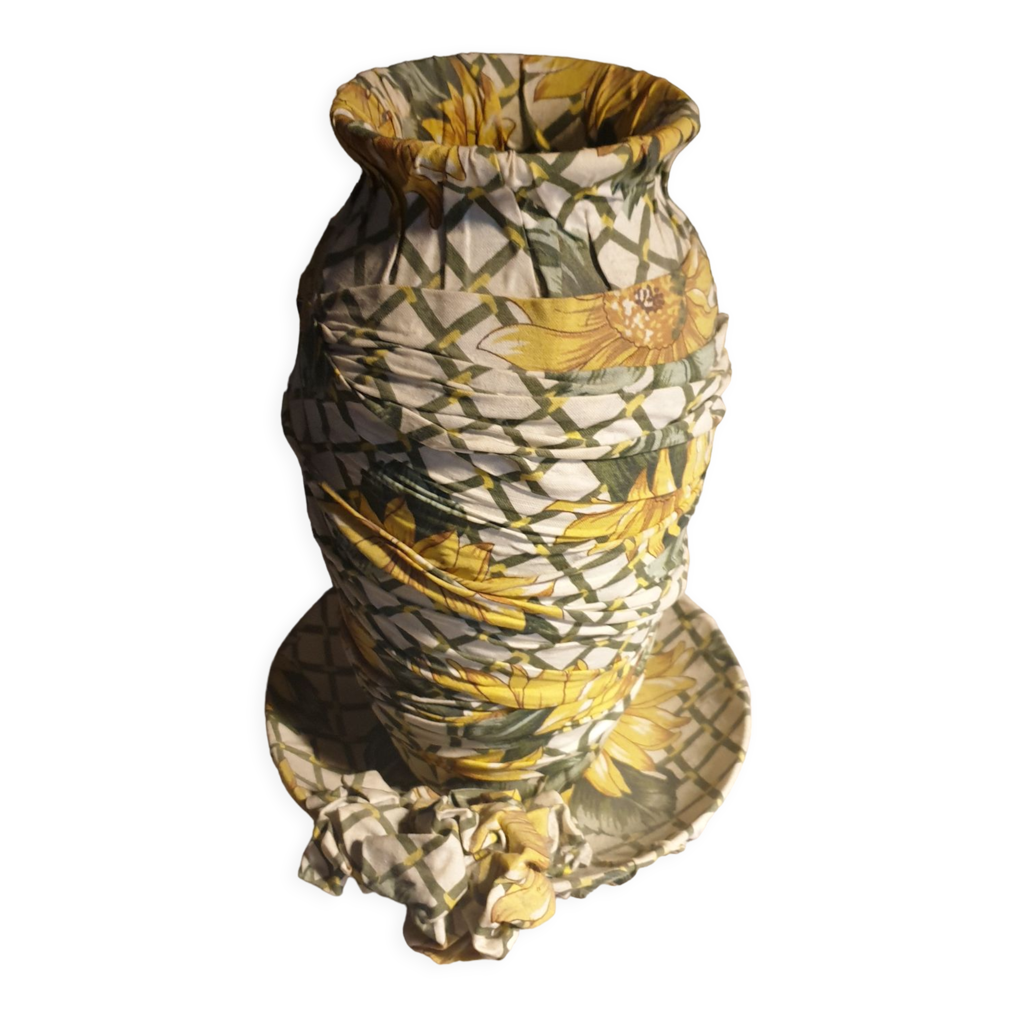 Vase and ceramic cup in fabrics