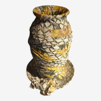 Vase and ceramic cup in fabrics