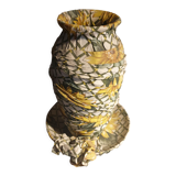 Vase and ceramic cup in fabrics