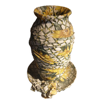 Vase and ceramic cup in fabrics