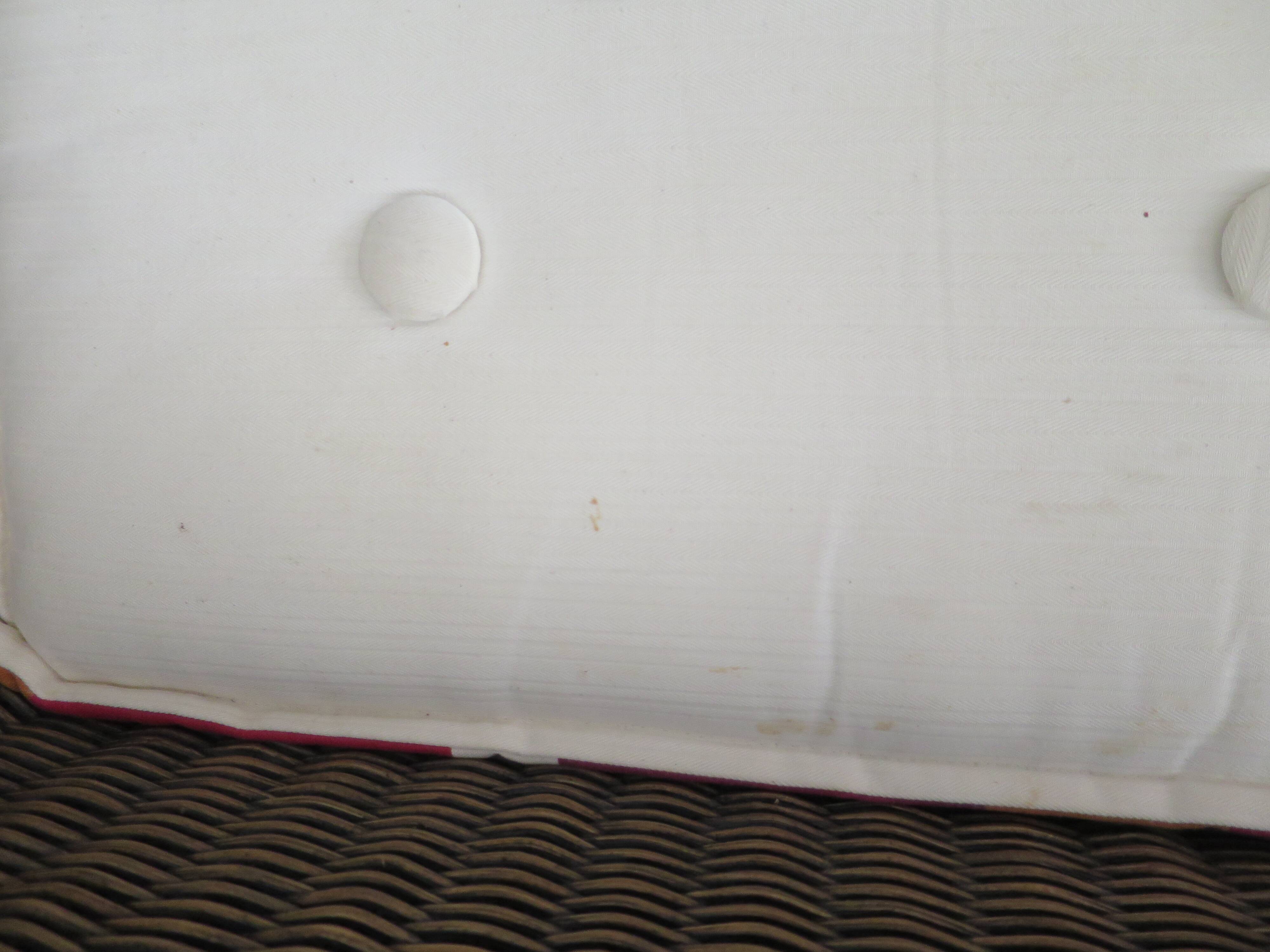 2 armchairs in woven rattan and wood, 1980s