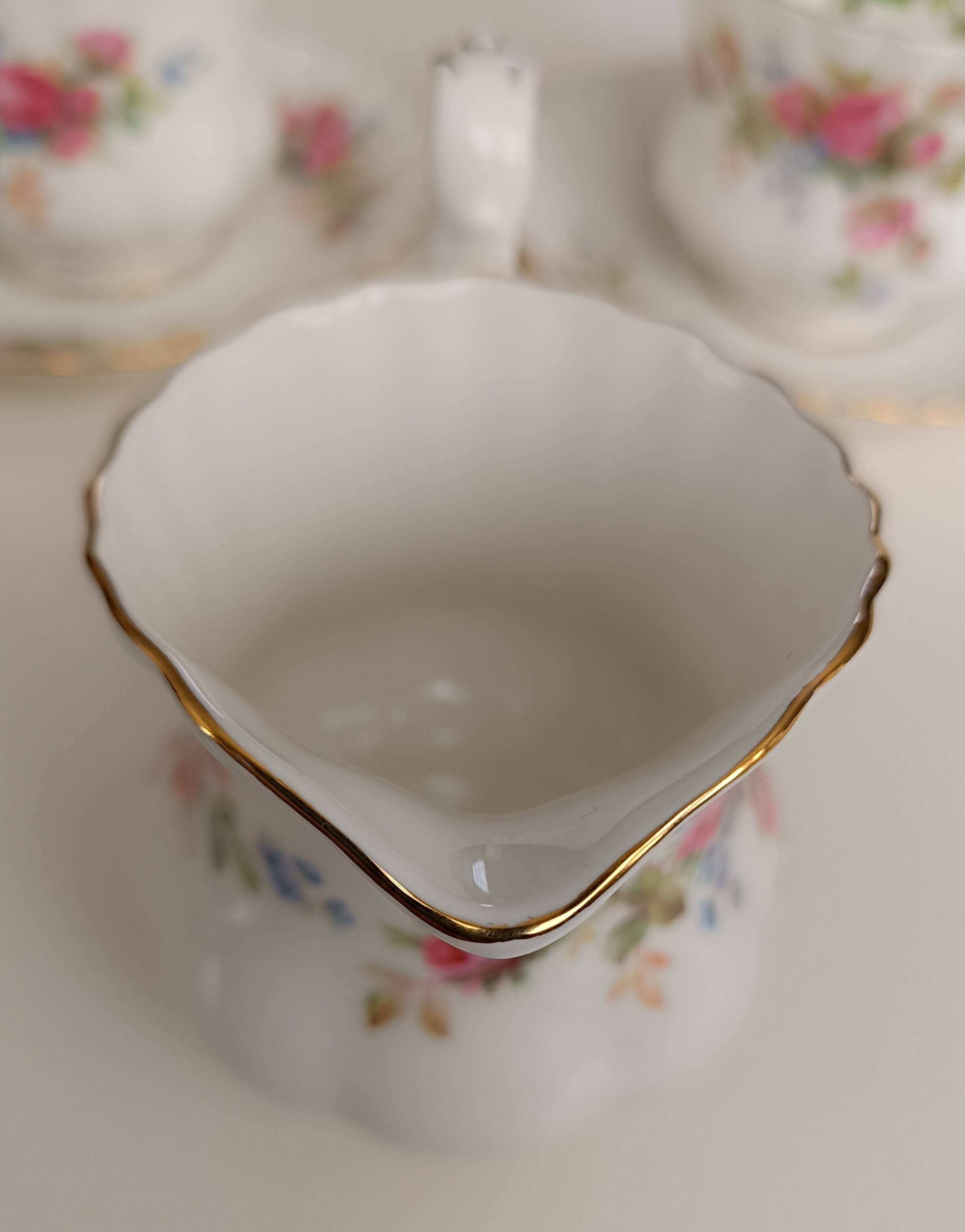 Royal Albert English porcelain set of 2 cups, saucers, and milk jug.