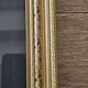 Golden frame with purple floral patterns