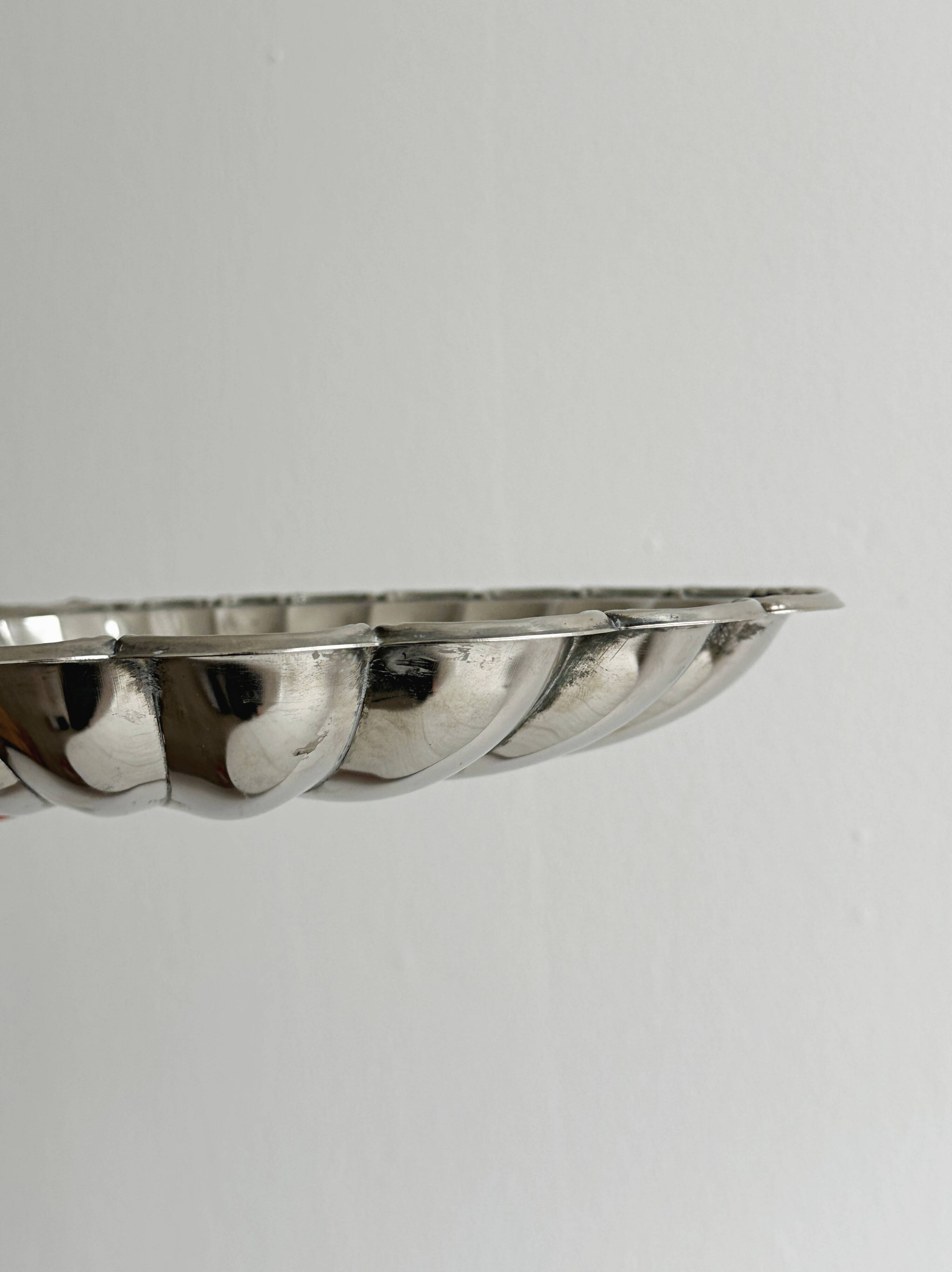 Large metal shell bowl