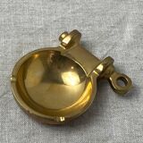 Brass ashtray in the shape of a boat shackle
