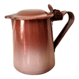 Old pitcher in brown enamelled sheet metal, spout and lid