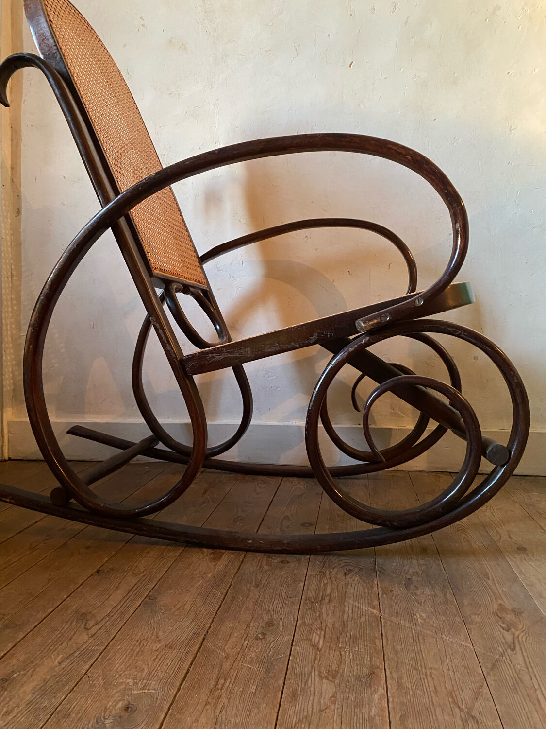 Wood and cane rocking chair